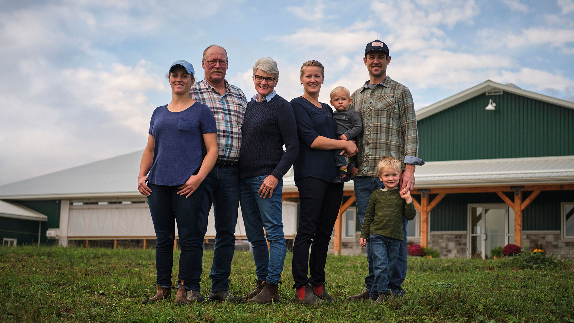 Family portrait of the Den Haans of Sheldon Creek Dairy on their family farm.
